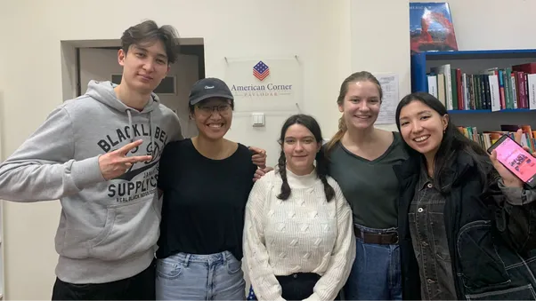 Kelsey Dabrowski [in the center] graduated from the University of Georgia, where she studied foreign languages and English as a second language (ESL). She has a few years of experience working as a tutor. A year before Kazakhstan she taught English in France 
